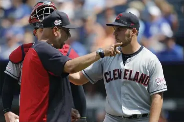  ?? COLIN E. BRALEY — THE ASSOCIATED PRESS ?? Indians manager Terry Francona has words with Trevor Bauer as Bauer is taken out in the fifth inning against the Royals on July 28 in Kansas City, Mo.