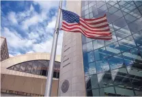  ?? ZACH GIVSON/BLOOMBERG ?? An American flag flies outside the headquarte­rs of the Securities and Exchange Commission in Washington, D.C. in 2018.