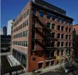  ?? CRAIG F. WALKER/GLOBE STAFF ?? The renovated, former GE Fort Point headquarte­rs will be the new home of 400 employees.