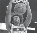 ?? RICK SCUTER/ AP ?? Arizona forward Zeke Nnaji dunks against San Jose State Thursday in Tucson. Arizona won 87-39.