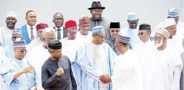  ??  ?? Front row from left: Former military president Gen. Ibrahim Babangida; Vice President Yemi Osinbajo; President Muhammadu Buhari; former Head of State, Gen. Yakubu Gowon; former Head of State Gen. Abdulsalam­i Abubakar and some state governors and deputy...