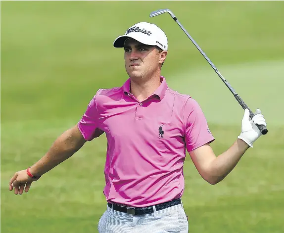  ?? — GETTY IMAGES ?? American Justin Thomas did not have a great first round Thursday at the CIMB Classic in Kuala Lumpur, Malaysia, a tournament he has won the past two years, shooting a round of 70 to sit six strokes back of leader Cameron Smith of Australia.