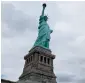  ?? AP ?? The Statue of Liberty was temporaril­y in the dark on Tuesday night after what a spokesman called an ‘unplanned outage.’ —