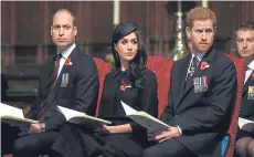  ??  ?? ROYAL TURN-OUT: Prince Harry, left, and Prince Charles, top, at the dawn service and, above, William, Meghan and Harry at Westminste­r Abbey