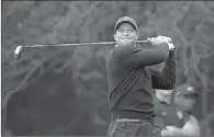  ?? MARK J. TERRILL/ASSOCIATED PRESS ?? Tiger Woods tees off at the second hole during the second round of the Northweste­rn Mutual World Challenge in Thousand Oaks, Calif., on Friday.