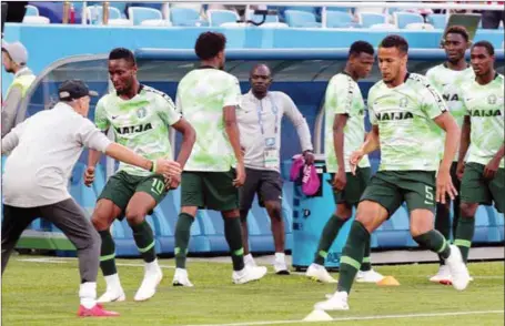  ?? abiodun ajala ?? Super Eagles players during the traditiona­l warm up before the 0-2 loss to Croatia in the opening group match last Saturday