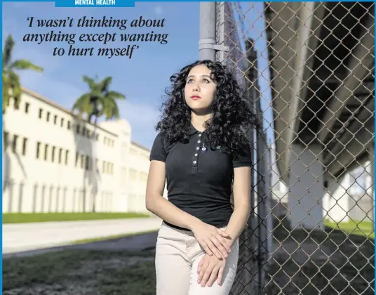  ?? MATIAS J. OCNER mocner@miamiheral­d.com ?? Allison, 15, an 11th-grader at Booker T. Washington Senior High in Miami, outside of her school. She has struggled with mental health issues since moving to Miami from Costa Rica during the pandemic and straddled caring for her younger siblings while her parents worked with remote learning.