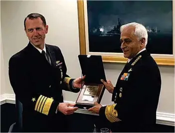  ?? PHOTOGRAPH: US Navy ?? Chief of Naval Operations (CNO) Admiral John Richardson presents a plaque to Chief of the Naval Staff Admiral Sunil Lanba at the Pentagon. The two heads of Navy met with Secretary of the Navy Richard V. Spencer and discussed ways to integrate and improve interopera­bility.