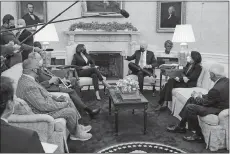  ?? PATRICK SEMANSKY/AP PHOTO ?? President Joe Biden and Vice President Kamala Harris meet with lawmakers Monday to discuss the American Jobs Plan in the Oval Office.