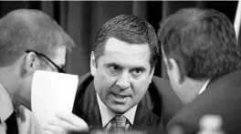  ?? J. SCOTT APPLEWHITE/AP ?? Rep. Devin Nunes, R-Calif, the ranking member of the House Intelligen­ce Committee, confers with Rep. Jim Jordan, R-Ohio, left, and Rep. John Ratcliffe, R-Texas, right, on Dec. 9.