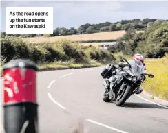  ??  ?? As the road opens up the fun starts on the Kawasaki