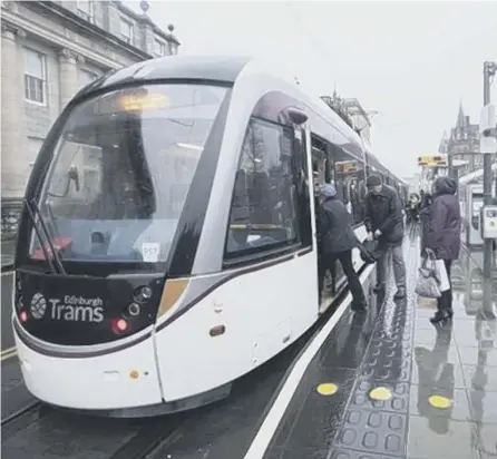  ??  ?? 0 Silly trams snake around Edinburgh empty, even at rush hour, adding to the many inconvenie­ncies of driving there