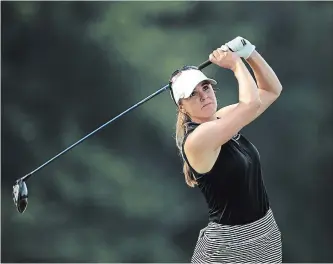  ?? NURPHOTO GETTY IMAGES ?? Anne-Catherine Tanguay of Canada tees off on the fifth tee during the final round of the Meijer LPGA Classic golf tournament at Blythefiel­d Country Club in Belmont, MI, USA Sunday, June 17, 2018.