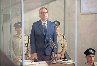  ??  ?? Adolf Eichmann, above, and being played by Ben Kingsley in the trial scenes from the 2018 film Operation Finale