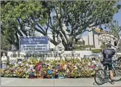  ?? Myung J. Chun Los Angeles Times ?? A MEMORIAL outside the church where the Taiwanese Presbyteri­an congregati­on rents space.