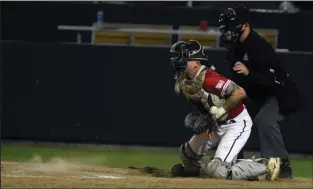  ?? NEWS PHOTO JAMES TUBB ?? Medicine Hat Mavericks catcher Zach Stark blocks a pitch in the dirt in his team’s 10-2 loss to the Moose Jaw Miller Express on Saturday night at Athletic Park.