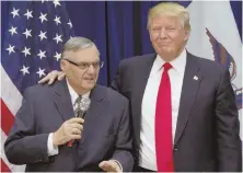  ?? AP FILE PHOTO ?? PALS: Maricopa County, Ariz., Sheriff Joe Arpaio campaigned with Donald Trump in Iowa, above, in 2016. The president has floated the idea of a pardon.