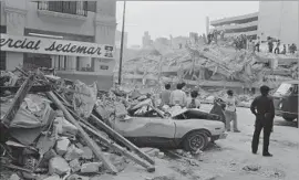  ?? John Downing Getty Images ?? THE MEXICO CITY earthquake in 1985 was a magnitude 8, demolishin­g many buildings in the capital, above. This week’s quake in central Mexico measured 7.1.