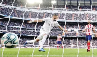  ?? GETTY ?? Karim Benzema, 32 anni, ha appena messo in rete: quinta all’Atletico, 13 in Liga, 18 in questa stagione