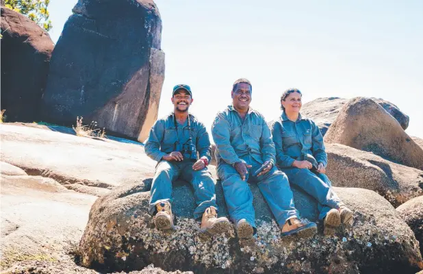  ?? Picture: SUPPLIED ?? IMPORTANT ROLE: Gunggandji Rangers Jimmito Harris, Harrison Smith and April Thomas near Yarrabah.