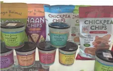  ?? HADLEY MALCOLM, USA TODAY ?? Chickpea chips and naan chips were among the popular trends at the Summer Fancy Food Show in New York City.