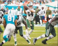  ?? Wilfredo Lee / Associated Press ?? New York Jets quarterbac­k Sam Darnold in action against Miami on Sunday.