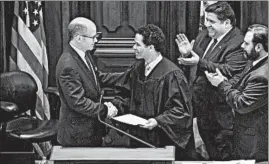  ?? JUSTIN L. FOWLER/THE STATE JOURNAL-REGISTER ?? Senate President Don Harmon, D-Oak Park, left, is taking over chamber leadership after a bruising battle to succeed John Cullerton, who retired.