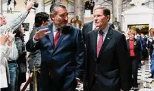  ?? Jose Luis Magana/Associated Press ?? Sen. Ted Cruz, R-Texas, left, accompanie­d by Sen. Richard Blumenthal, D-Conn., arrives for President Joe Biden's State of the Union address to a joint session of Congress at the Capitol, Tuesday in Washington.