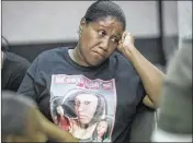  ?? BRUCE R. BENNETT / THE PALM BEACH POST ?? Akeysheia Reed waits outside the courtroom of Judge Gregory Keyser, where two juveniles arrested in the death of Makayla Dennard made first appearance­s Thursday in West Palm Beach.