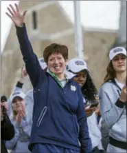  ?? ROBERT FRANKLIN — SOUTH BEND TRIBUNE VIA AP ?? Notre Dame head coach Muffet McGraw waves to fans as she is recognized on stage during the team’s arrival on campus in South Bend, Ind., Monday following their win in the NCAA college national championsh­ip game on Sunday.