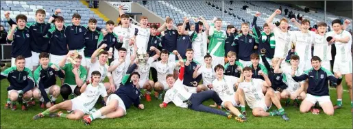  ??  ?? The St. Peter’s College squad celebrate after bridging a gap of 25 years with Leinster Senior football ‘A’ success in Portlaoise on Friday.