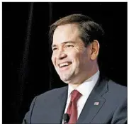  ?? JACQUELYN MARTIN/AP ?? Rather than lowering the top tax rate, the plan proposed by Republican presidenti­al candidate Sen. Marco Rubio instead offers a large new credit for families with children.