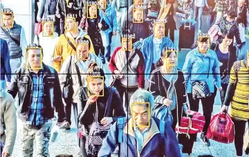  ?? — Photos for The Washington Post by Gilles Sabrié ?? A CCTV display using the facial-recognitio­n system Face in Beijing.