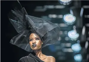  ?? /ALET PRETORIUS / GALLO IMAGES ?? Mourning and sombre approach by David Tlale somehow lit up his fashion show at the AFI.