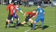  ??  ?? Donald Park outmanoeuv­res the opposition to claim possession of the ball.