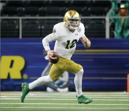  ?? MICHAEL AINSWORTH — THE ASSOCIATED PRESS ?? Upon his return to campus last winter, Notre Dame quarterbac­k Ian Book immediatel­y worked on his leadership skills and also making the difficult and tight downfield passes.