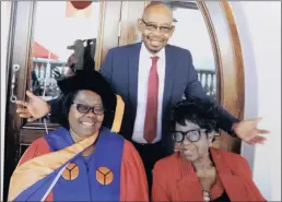  ??  ?? Dr Irene Makhwaza with her mother, Lydia Mzoneli and husband,thami Makhwaza, on a day of her graduation.