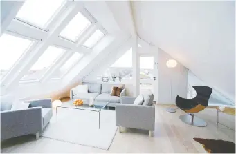  ??  ?? Velux makes exceptiona­lly well-designed skylights for both peaked and flat roofs.