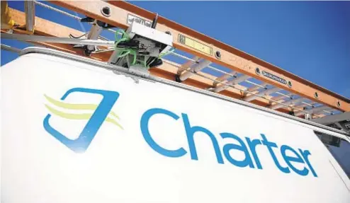  ?? /JEFF ROBERSON /AP ?? Charter Communicat­ions will not merge with Time Warner any time soon after state Public Serrice Commission ruling Friday.