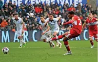  ?? ?? PEN POWER: Akpom wraps up victory from the spot