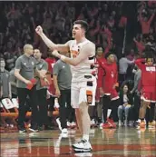  ?? Adrian Kraus Associated Press ?? SYRACUSE guard Joe Girard III, who had 14 points, celebrates a 75-72 win over North Carolina State.