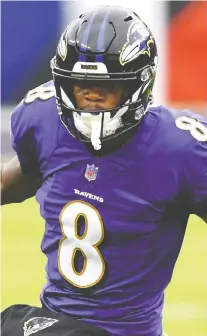  ?? MITCHELL LAYTON/ USA TODAY SPORTS FILES ?? At least seven starters were among Ravens players unavailabl­e to practice or play through Tuesday, including quarterbac­k Lamar Jackson.