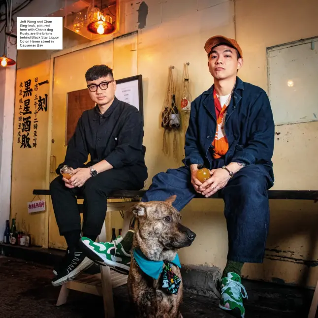  ?? Jeff Wong and Chan Sing-leuk, pictured here with Chan’s dog Rusty, are the brains behind Black Star Liquor Co on Haven street in Causeway Bay ??