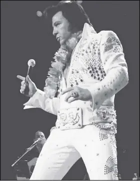  ?? SUBMittEd PHoto ?? Thane Dunn gyrates on stage as Elvis Presley. The tribute artist is going on tour to honour the 40th anniversar­y of the King’s death.