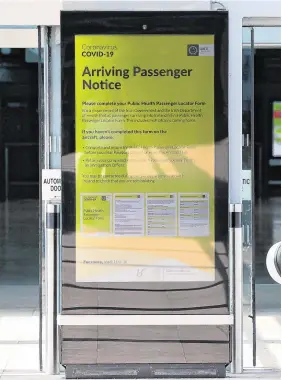  ??  ?? Welcome
back: A notice for arriving passengers regarding the Covid-19 passenger locator form at Terminal 2 at Dublin Airport