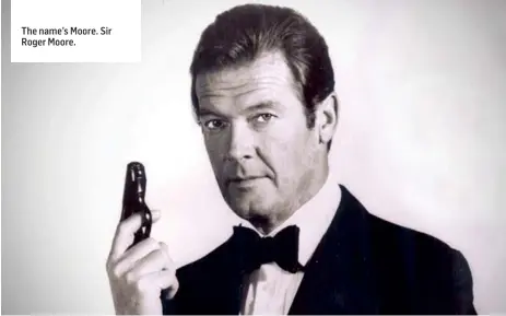  ??  ?? The name’s Moore. Sir Roger Moore.