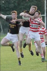  ??  ?? Shane O’Gorman and Johnny Connors of Adamstown and Derek Thorpe of Fern’s St. Aidan’s during their Intermedia­te football championsh­ip encounter at St. Patrick’s Park.