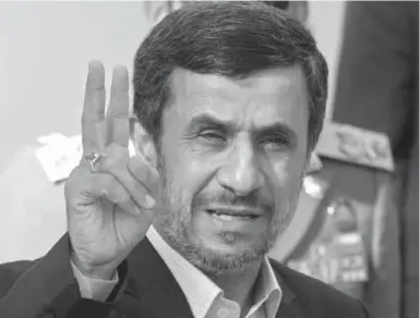  ?? VAHID SALEMI/THE ASSOCIATED PRESS ?? Iranian President Mahmoud Ahmadineja­d flashes a victory sign in Tehran. He addresses the UN next week.