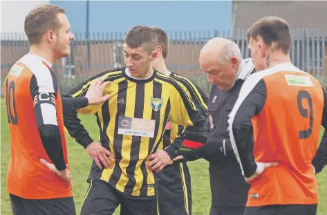  ??  ?? Ayton’s Paul Mills (number nine) and Scalby’s Tyler Whiteman sent off during their 1-0 defeat at Scalby in Division Two Pictures by Steve Lilly