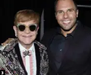  ??  ?? 3 3. With Elton John in 2018.